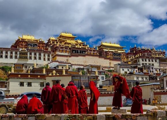 Monks in front of the Sumtseling Monastery